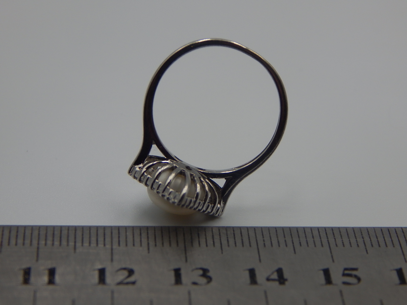 Серебряное кольцо с цирконием и жемчугом (33281351) 4