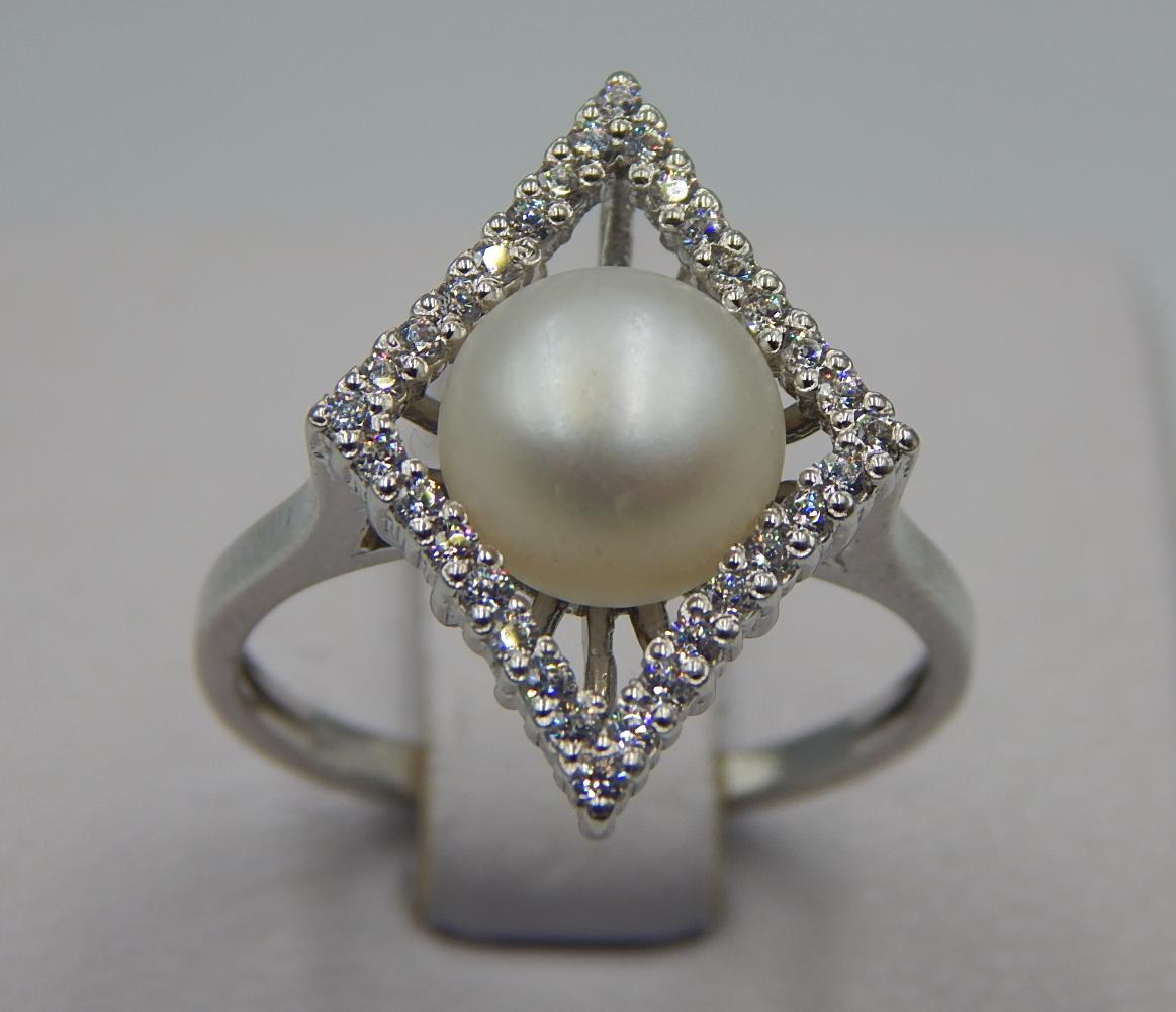 Серебряное кольцо с цирконием и жемчугом (33281351) 0