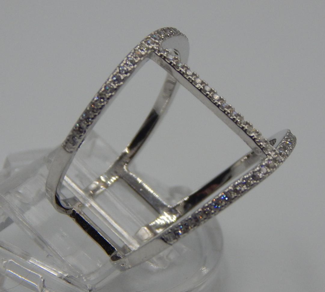 Серебряное кольцо с цирконием (33725421) 1