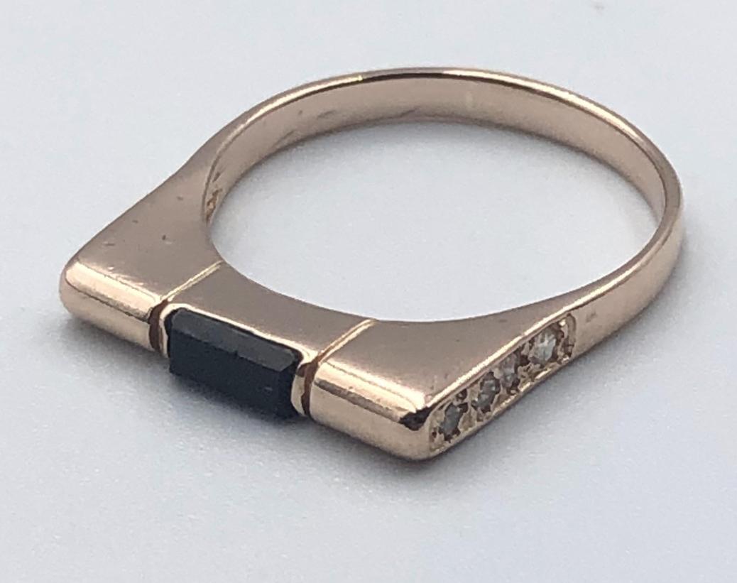 Перстень из красного золота с ониксом и цирконием (32184382) 1