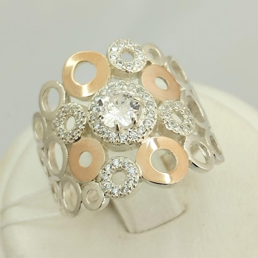 Серебряное кольцо с золотой вставкой и цирконием (33734153) 0