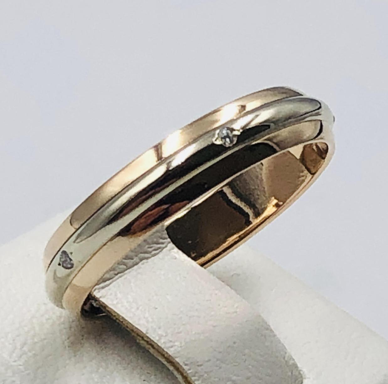 Обручальное кольцо из красного и белого золота с цирконием (33615842) 0
