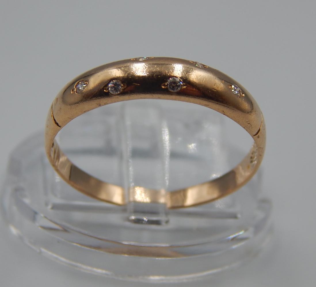 Обручальное кольцо из красного золота с цирконием (33500914) 0