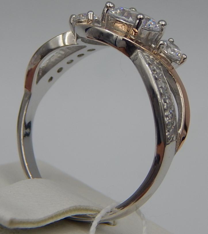 Серебряное кольцо с позолотой и цирконием (28353411) 1