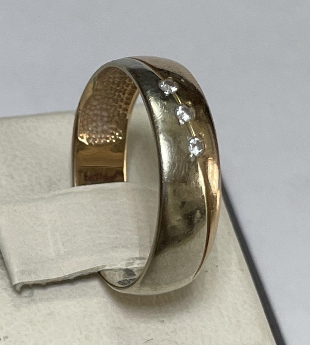 Обручальное кольцо из красного и желтого золота с цирконием (33675509)  1