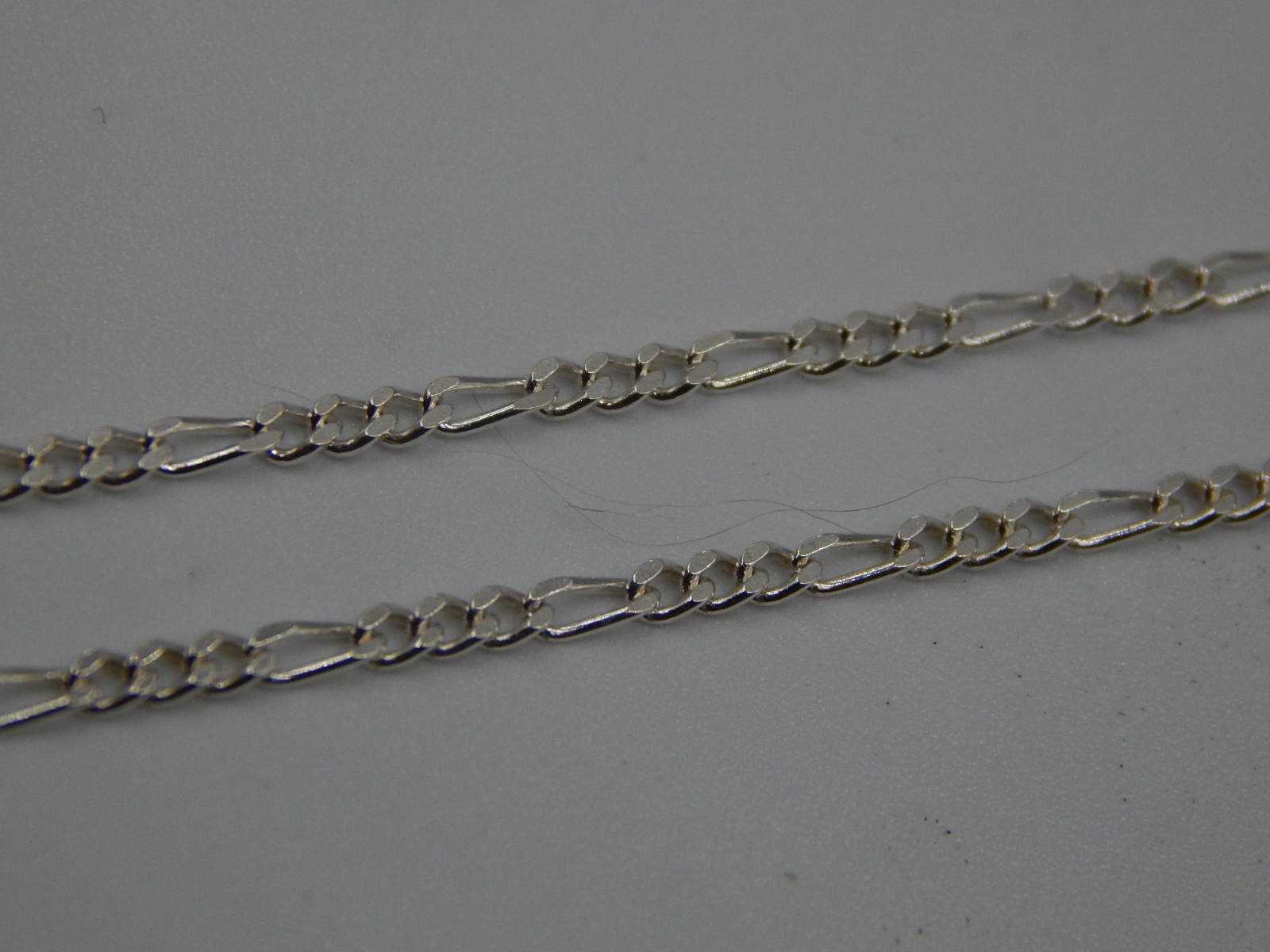 Серебряная цепь с плетением Картье (33655335) 1