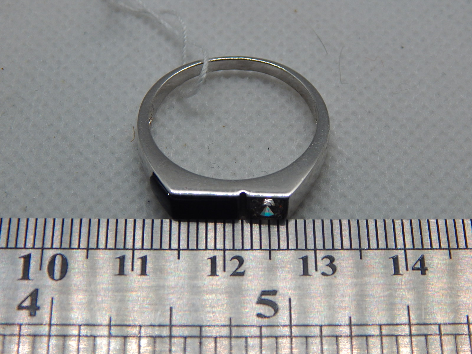 Серебряный перстень с ониксом и цирконием (30657809) 1
