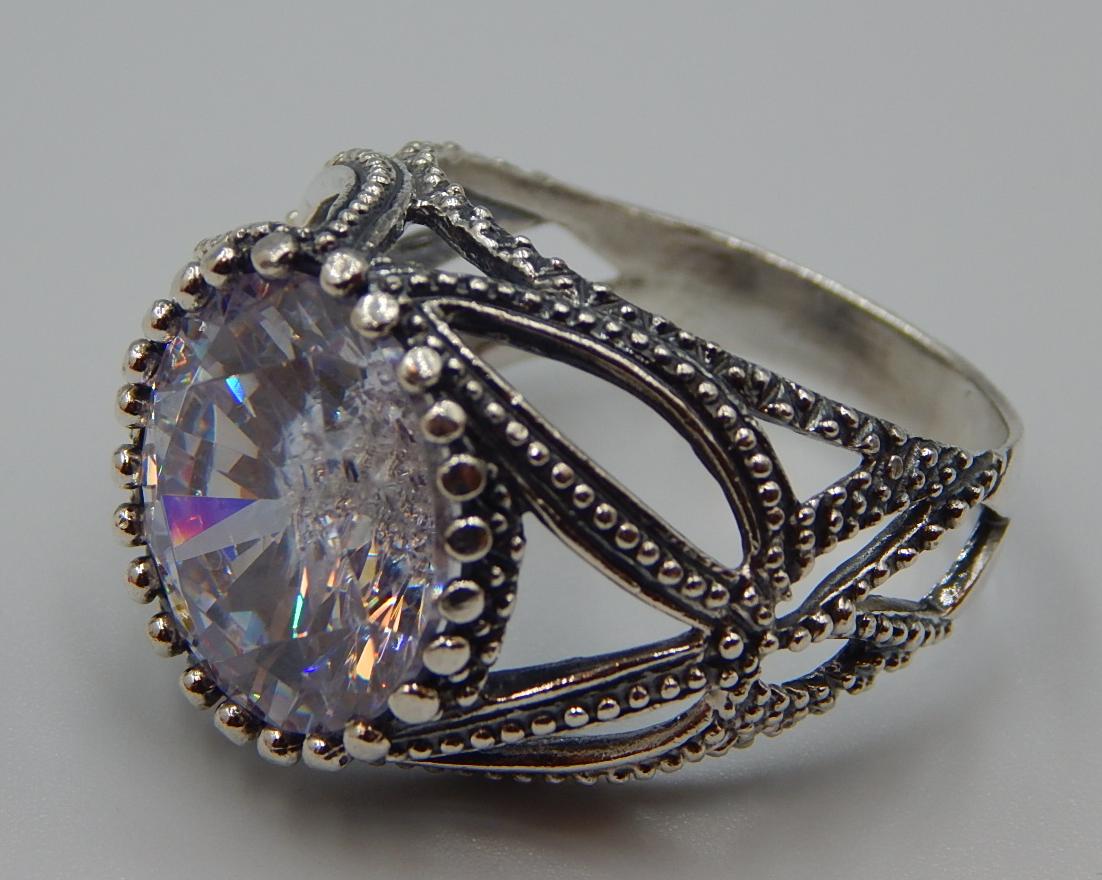 Серебряное кольцо с цирконием (30674459) 1