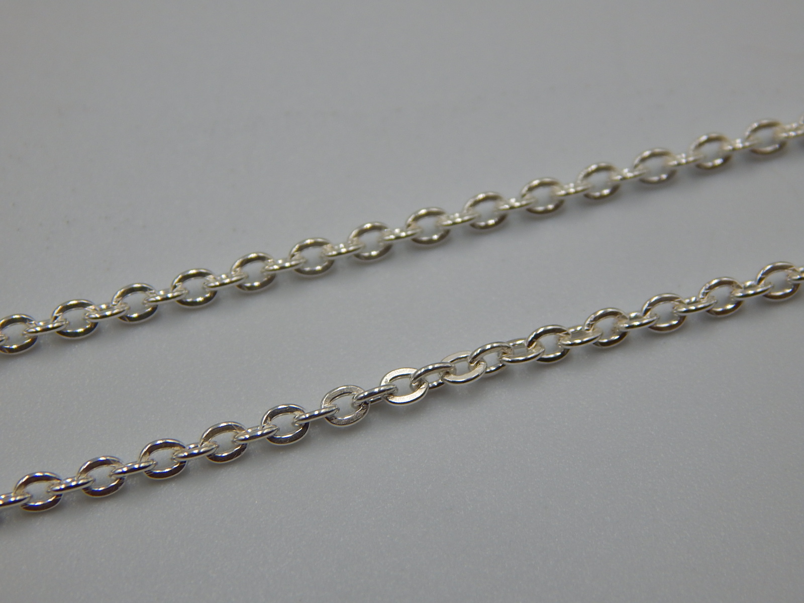 Серебряная цепочка с плетением ролло (30979931) 1