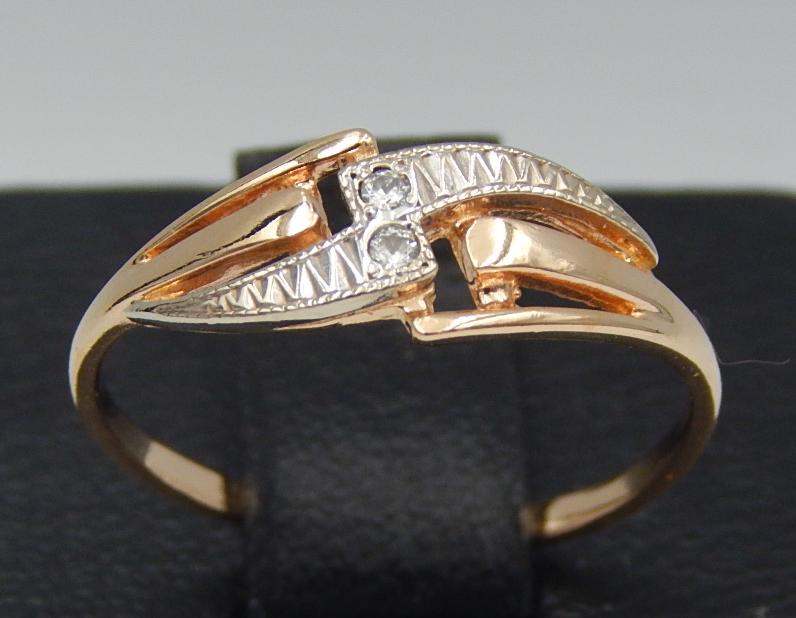 Кольцо из красного и белого золота с цирконием (30509385) 0