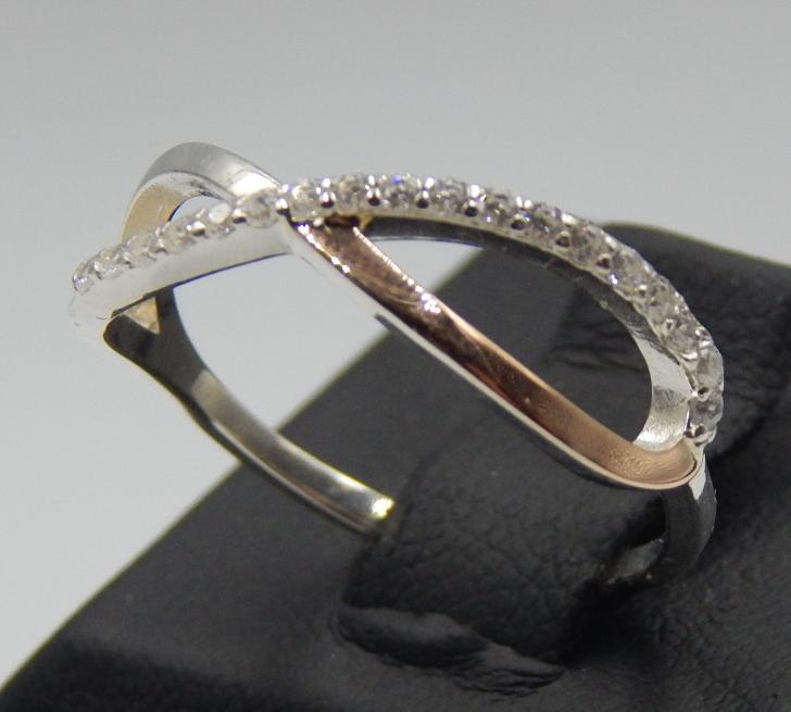 Серебряное кольцо с позолотой и цирконием (31646934) 0