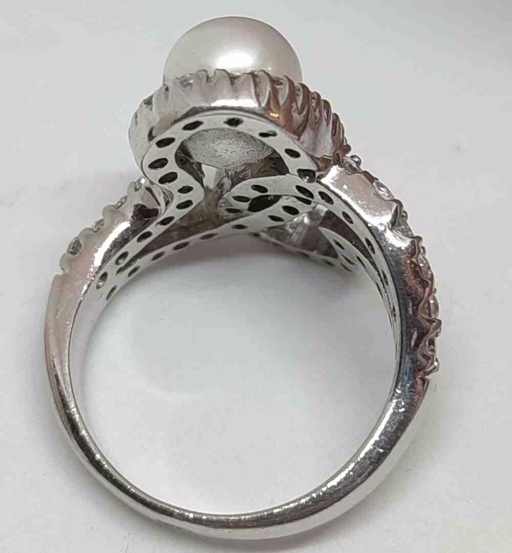 Серебряное кольцо с жемчугом и цирконием (28860074) 1