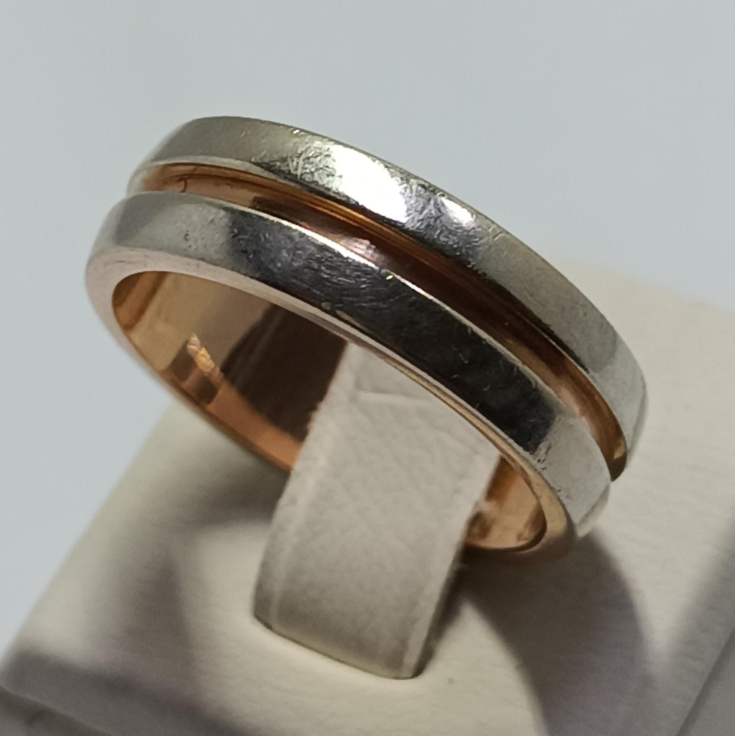 Обручальное кольцо из красного и белого золота (33809271) 0