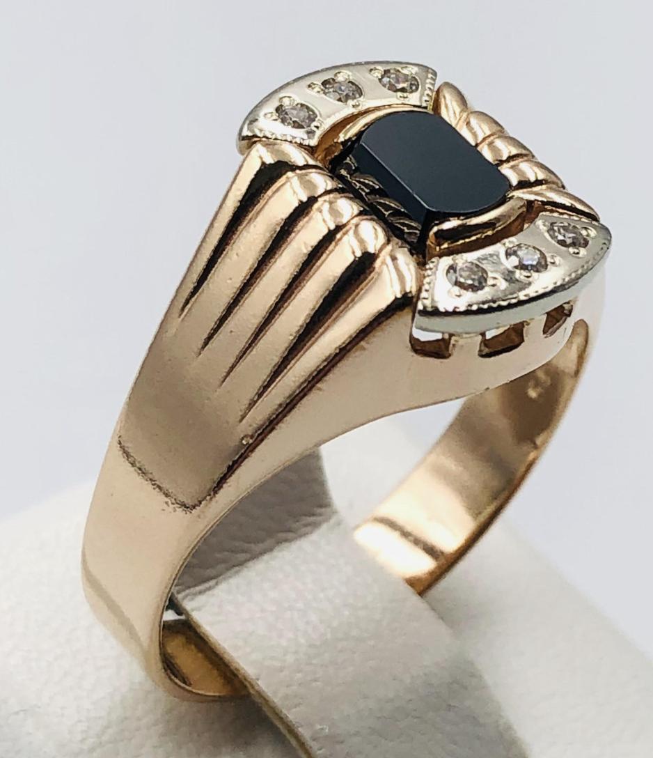 Перстень из красного и белого золота с ониксом и цирконием (33064243) 0
