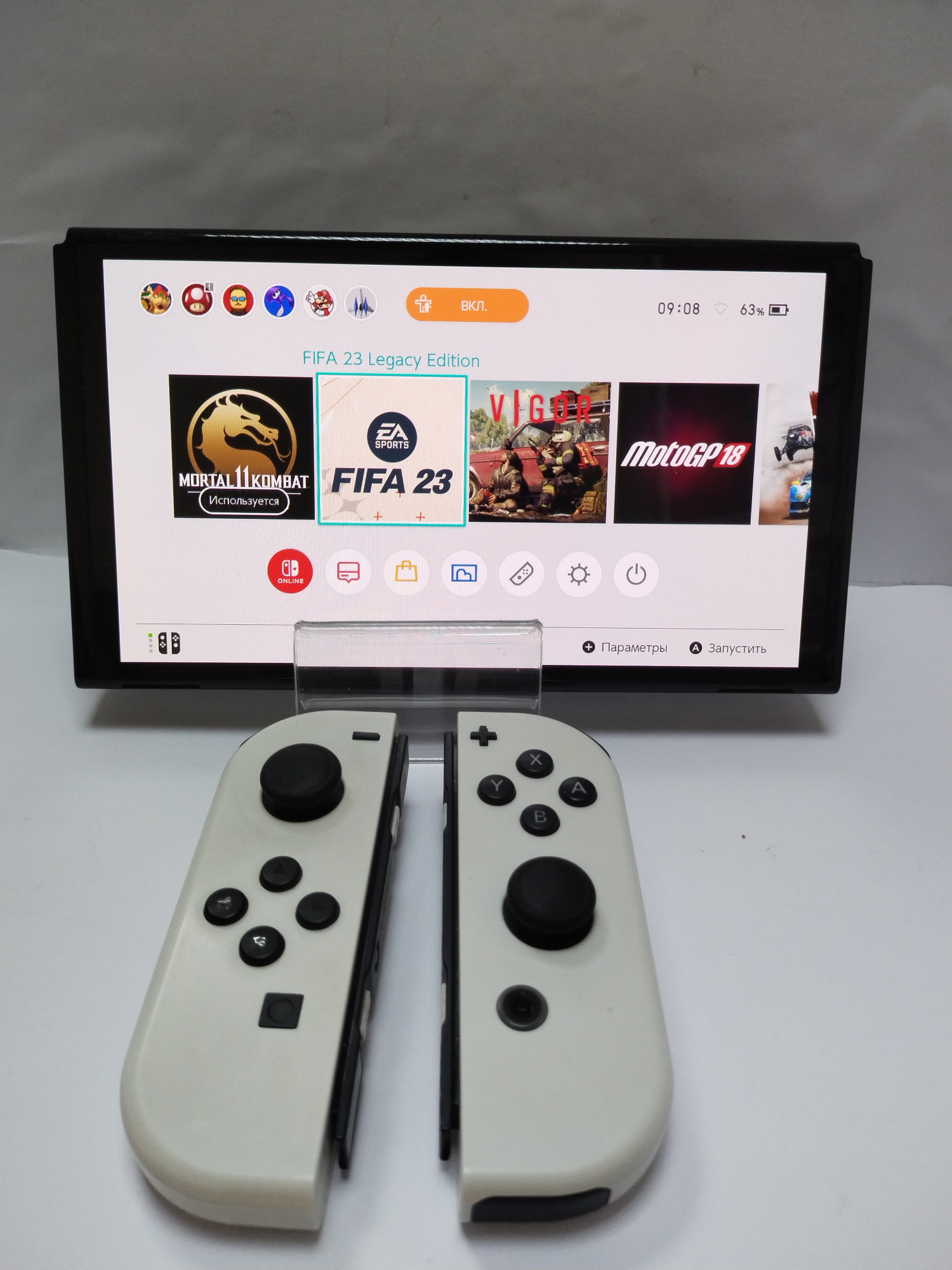 Портативная игровая приставка Nintendo Switch OLED 4