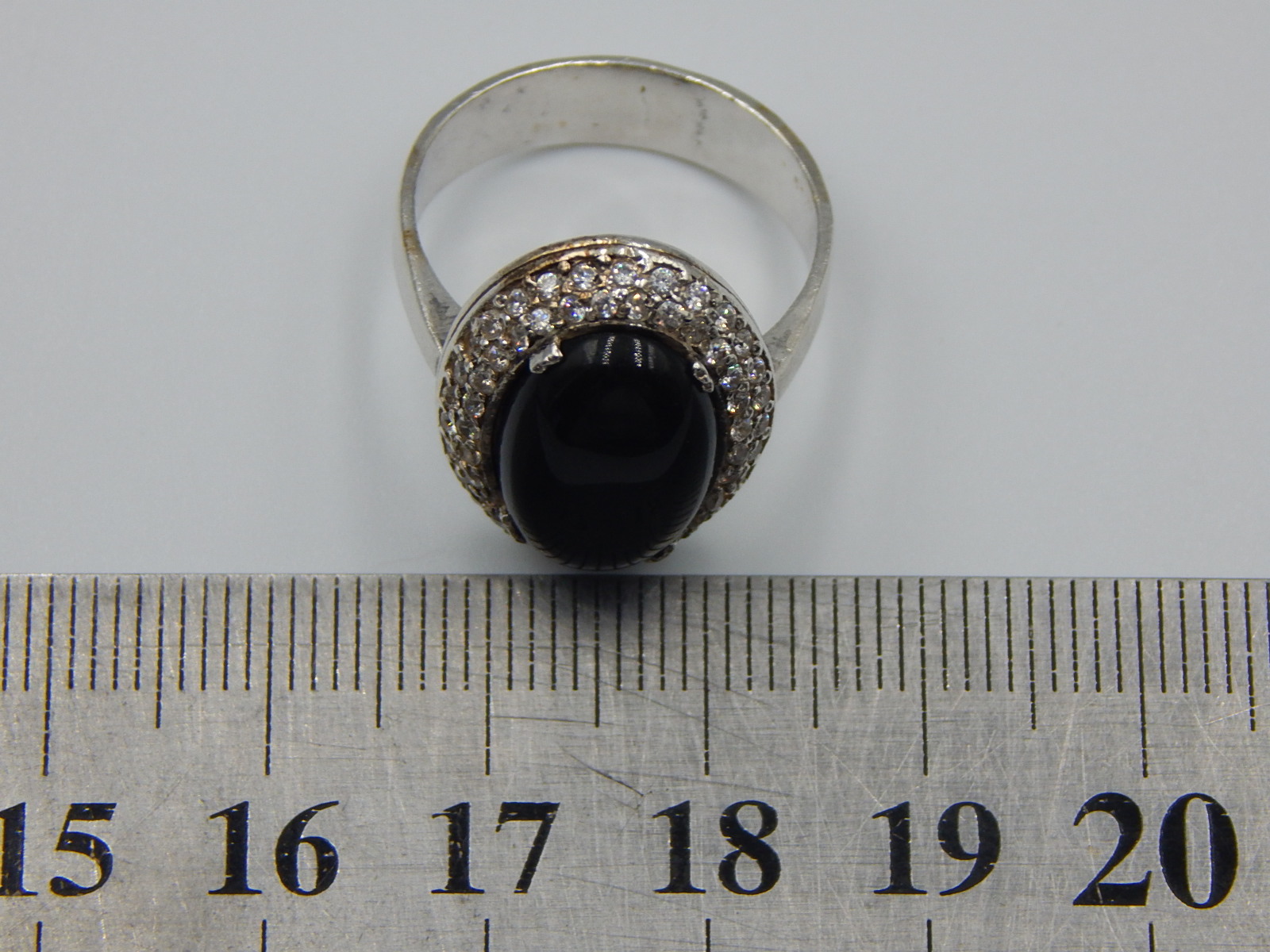 Серебряное кольцо с ониксом и цирконием (32417946) 4