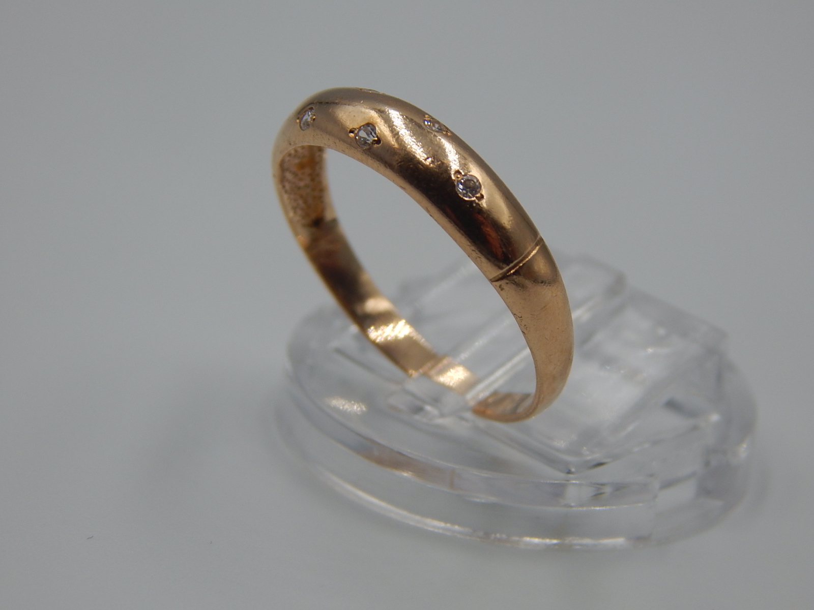 Обручальное кольцо из красного золота с цирконием (33500914) 1