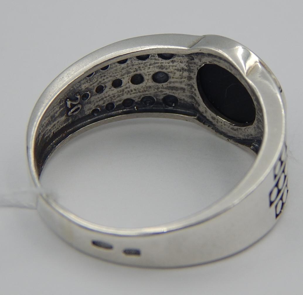 Серебряное кольцо с ониксом (29252327) 1