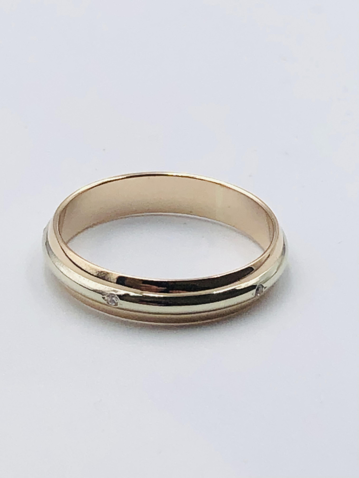 Обручальное кольцо из красного и белого золота с цирконием (33615842) 1