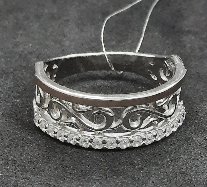 Серебряное кольцо с цирконием и золотой вставкой (31299385) 0