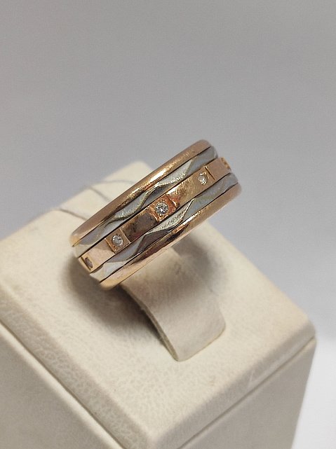 Обручальное кольцо из красного и белого золота с цирконием (33808569) 1