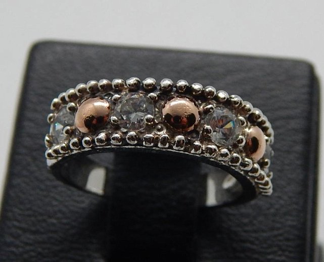 Серебряное кольцо с позолотой и цирконием (31445861) 0