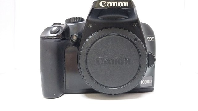 Фотоапарат Canon EOS 1000D 0