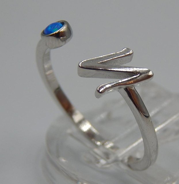 Серебряное кольцо с опалом (33751137) 1