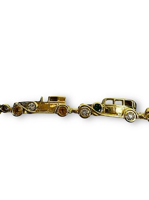 Браслет из желтого золота с изумрудом, топазом, рубином и бриллиантом (-ми) (32156864) 2