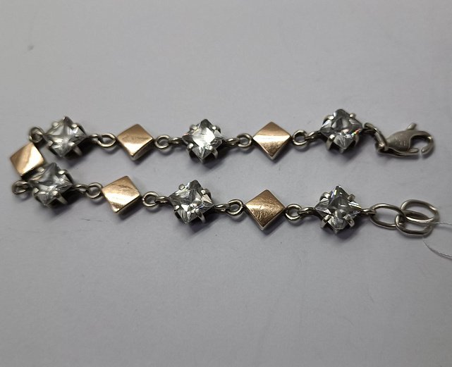 Срібний браслет із золотою вставкою та цирконієм (33902946) 1