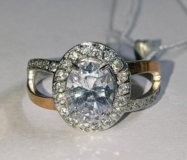 Серебряное кольцо с золотой вставкой и цирконием (25316950) 0