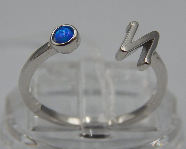 Серебряное кольцо с опалом (33751137) 0