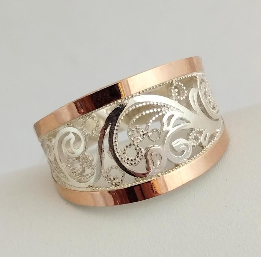 Серебряное кольцо с золотой вставкой и цирконием (33782911) 0
