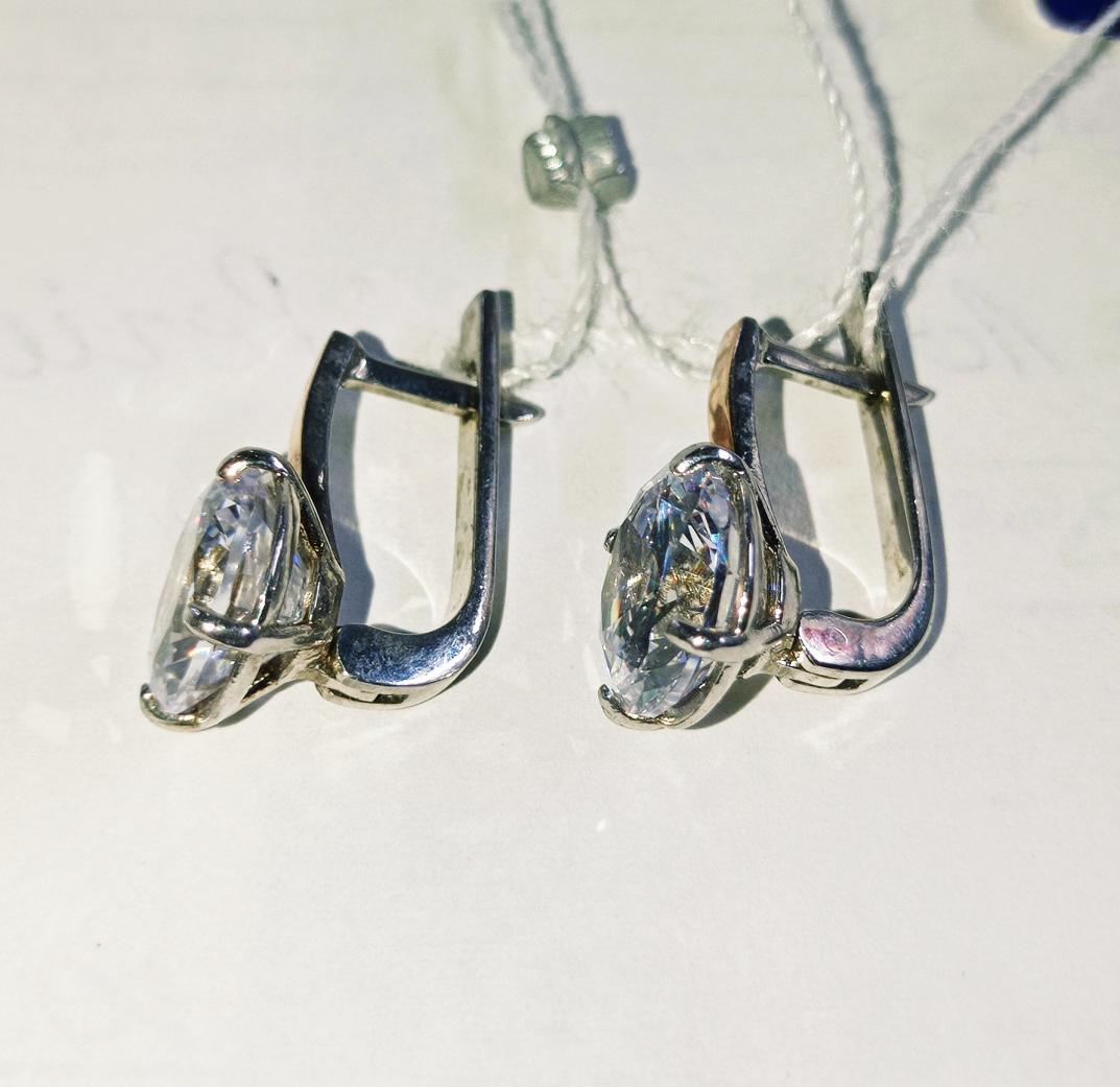 Срібні сережки із золотою вставкою та цирконієм (26556205) 1