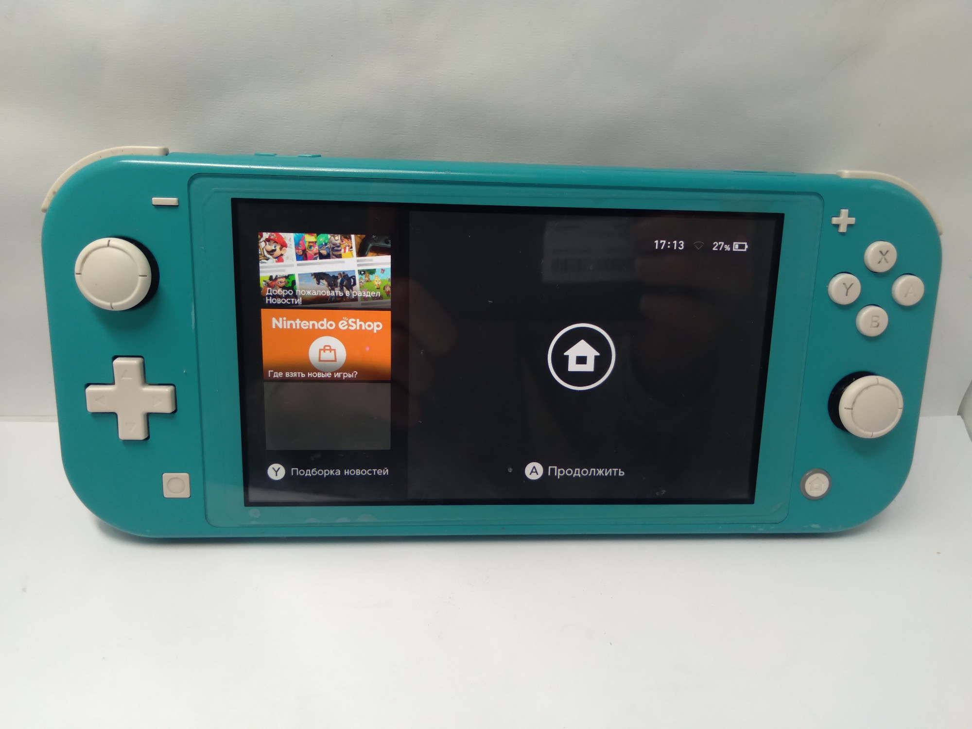 Портативная игровая приставка Nintendo Switch Lite  1