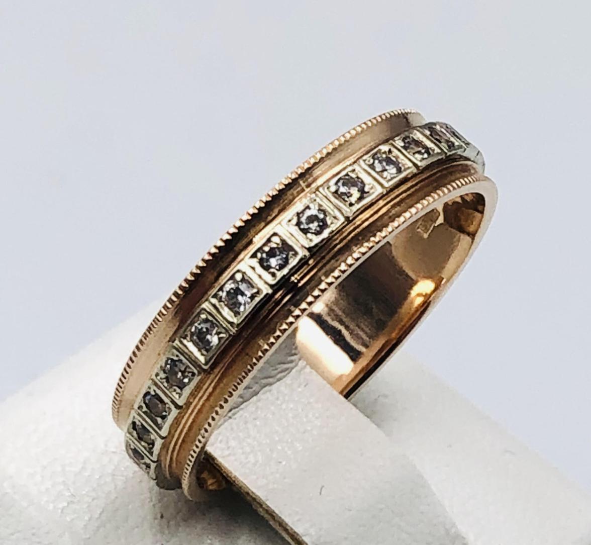 Обручальное кольцо из красного и белого золота с цирконием (33720488)  0