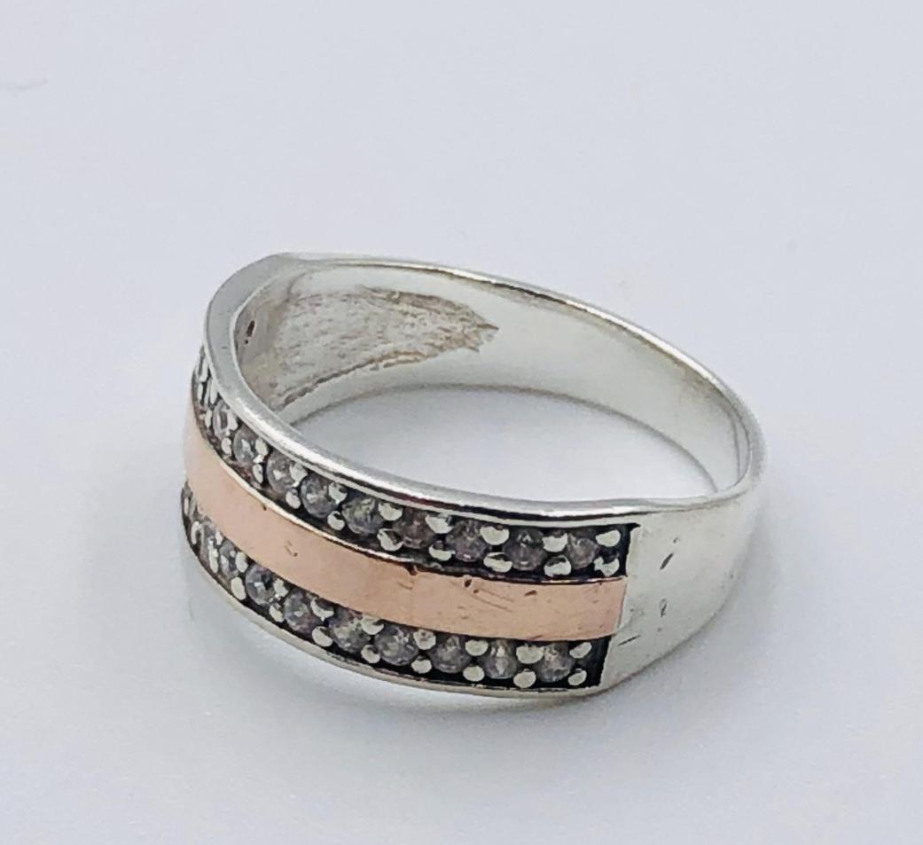 Серебряное кольцо с позолотой и цирконием (33792976) 1